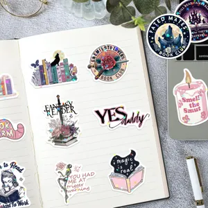 Holographic bookish romance stickers on a notebook with floral and literary themes