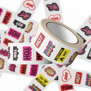 Close-up of decorative sticker roll with multiple 'HOT' text graphic designs
