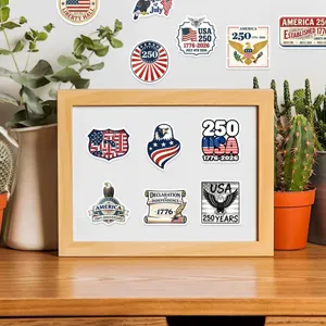 Detailed view of various patriotic US 250th anniversary stickers inside a wooden frame