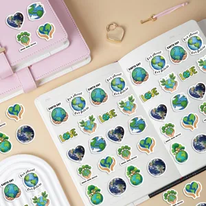 Detailed view of Earth Day decorative stickers with eco-friendly slogans for journaling