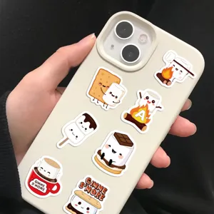Cute kawaii marshmallow and s'mores cartoon stickers decorating a white smartphone case