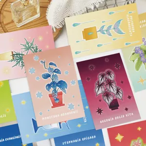Detailed view of assorted magic plant illustration postcards with botanical names.