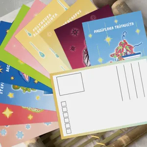 Close-up of magic plant postcards set showing vibrant botanical illustrations and blank back