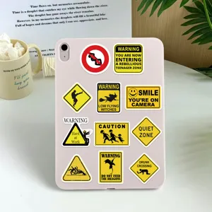 Set of funny warning sign stickers applied on a tablet case, waterproof vinyl decal