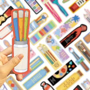Detailed view of a creative cartoon paintbrush bookmark for DIY journaling and reading