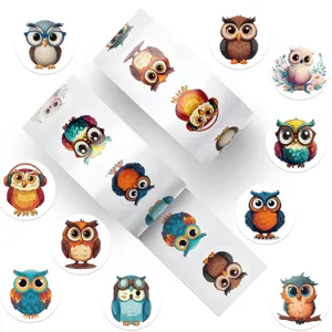 Detailed macro view of cute cartoon owl sticker roll for DIY journal decoration and sealing