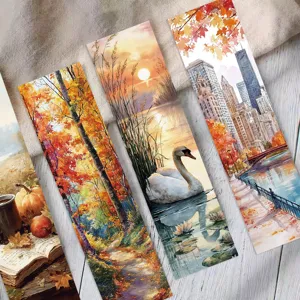 Detailed view of autumn-themed oil painting bookmarks with swan and forest designs