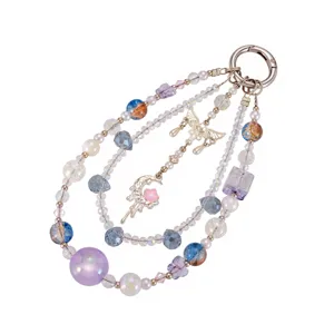 Elegant multi-layer beaded charm with moon and butterfly accents for phone or bag