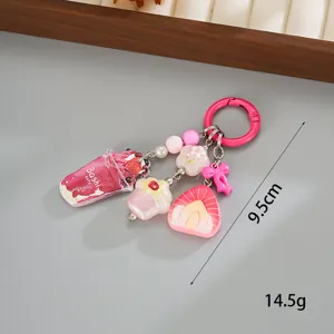 Detailed view of the 9.5cm acrylic fruit dessert keychain showing size and 14.5g weight