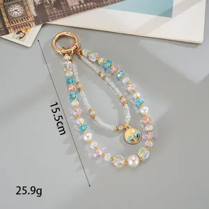 Detailed view of colorful double-layer crystal pearl charm with floral pendant