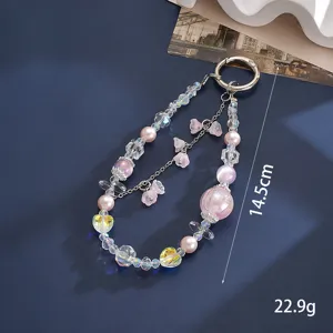 Detailed macro view of pink beaded phone charm with 14.5cm length and 22.9g weight info