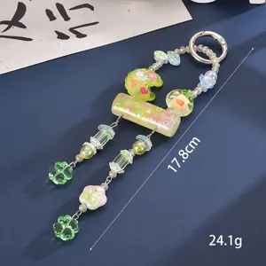Detail view of candy-colored beaded charm showing length of 17.8cm and 24.1g weight