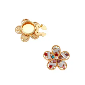 Detailed look at the front and back of colorful rhinestone flower shirt collar pins