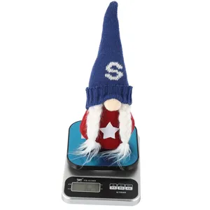 Detailed view of American Independence Day gnome plush doll with knit star and letter design.