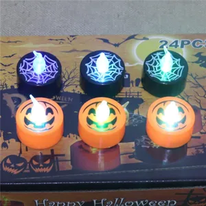 Halloween LED tea light candles, pumpkin and spider web designs, decorative party lights.