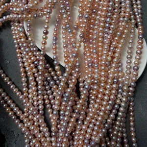 Macro view of 6-6.5mm candy-colored freshwater pearl strands for DIY jewelry designs