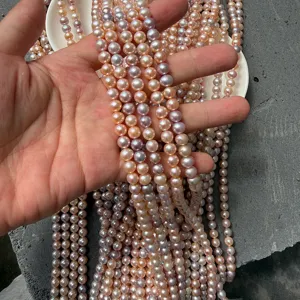 Close-up of 6-6.5mm candy-colored freshwater pearls with high natural luster and round shape