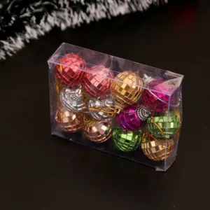 Ensemble d'ornements de sapin de Noël boule disco colorée dans une boîte transparente