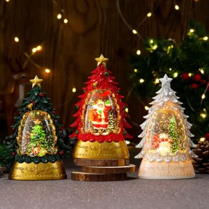 Christmas tree water globe night lights set, glowing holiday desktop decoration details.