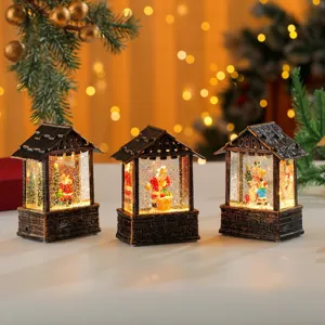 Detailed view of Christmas glowing snow globe cabin lanterns with festive micro landscape decor.