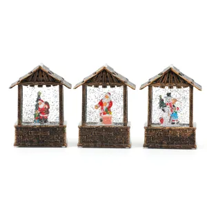 Christmas snow globe lanterns with Santa and snowman figures, festive home decoration.