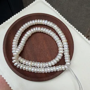 Macro detail of 108 natural freshwater pearls with lustrous Tibetan style finish