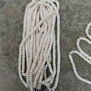 Detailed macro view of 8-9mm natural Tibetan style pearl beads for jewelry making projects
