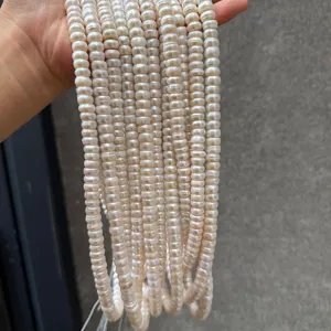 Detailed macro shot of natural white 8-9mm seedless pearls with natural luster