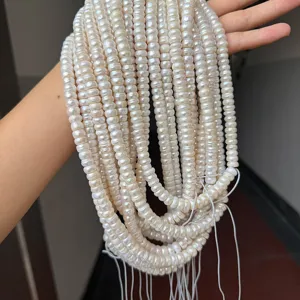 Close-up of multiple strands of natural 8-9mm Tibetan style pearl prayer beads