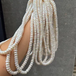 Detailed close-up of 8-9mm natural white pearl strands showing texture and luster.