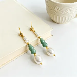 Elegant freshwater pearl and aventurine earrings, featuring Chinese style design with gold details.