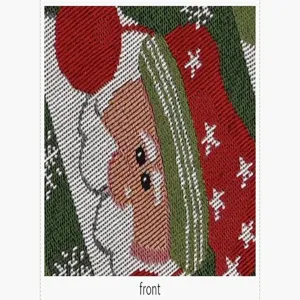Weihnachten gestrickt Tischläufer Stoff Detailaufnahme, festliches rot und grün Muster.
