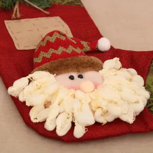 Gran calcetín de Navidad de yute 3D con Papá Noel, ideal para decoración festiva y regalos.