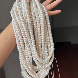 Close-up detail of natural freshwater pearl strands for 108 bead Tibetan prayer mala