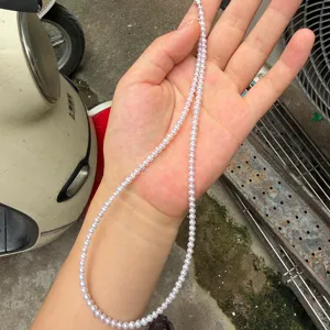 Natural freshwater pearl semi-finished strand detail showing small 3-3.5mm size beads.