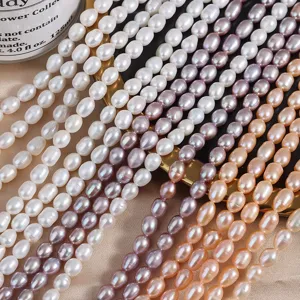 Detail shot of colorful 5-6mm natural freshwater rice pearl strands for DIY jewelry making.