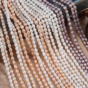 Detail view of colorful natural freshwater rice pearl strands, perfect for DIY jewelry making.