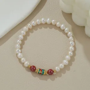 Echte Süßwasserperlen Armband mit roten Zinnober Perlen und Metall Charms für Damen Schmuck.
