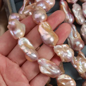Natural freshwater baroque pearl strand 40cm, large irregular pink pearl beads with strong luster.