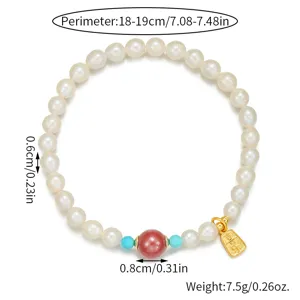 Natürliches Süßwasserperlen Armband mit rotem Achat, Türkis und goldenem Anhänger 18-19cm.