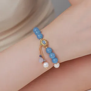 Neues chinesisches blaues Perlenarmband mit Perlen und Gold-Filigran-Anhänger für den Alltag.