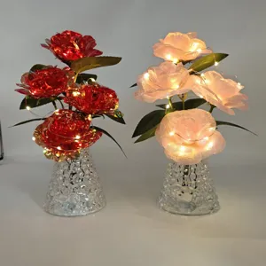 LED rose flower bouquet night light details showing glowing floral arrangement and textured vase.