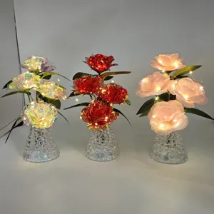 Artificial rose flower bouquet with LED fairy lights, glowing night light for home decor.