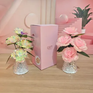 Vista dettagliata del bouquet di rose artificiali luce LED notturna con confezione.
