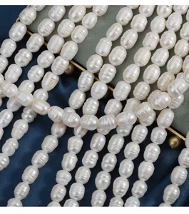 Natural freshwater pearl strand detail shot, 9mm deep threaded large hole beads, jewelry DIY.