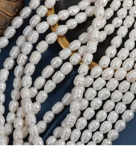 Natural freshwater pearl strands, 9mm deep threaded rice beads with large holes, elegant white.