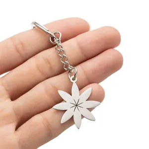 Minimalist stainless steel flower pendant keychain bag charm accessories chic design.