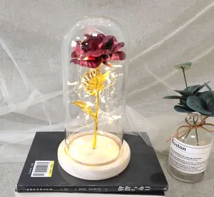 Glass dome rose lamp detail view, fairy lights inside, warm romantic decor gift.