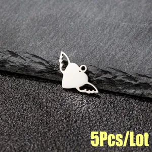 Close up of silver metal heart angel wing pendant, DIY jewelry making accessory detail view.