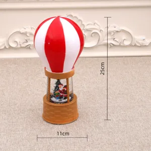 Christmas snow globe hot air balloon music box, festive decoration gift with LED lights and water.